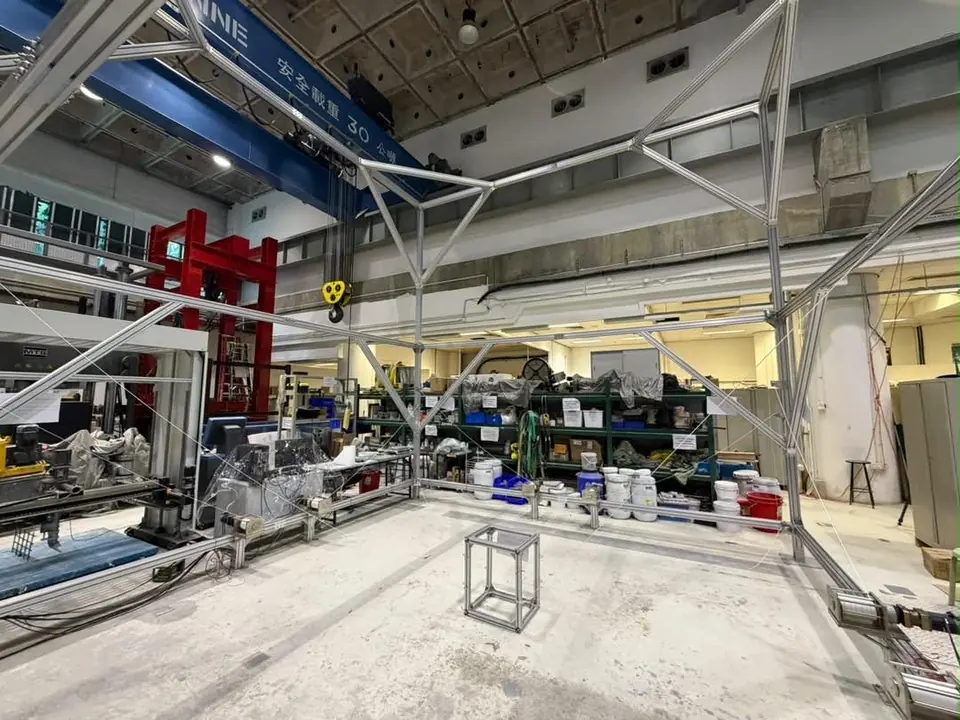 The assembled CDPR for 3D concrete printing in the laboratory